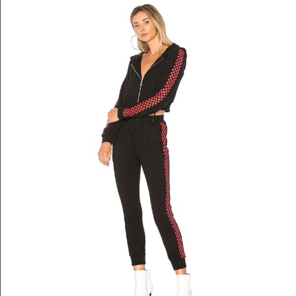 Danielle Guizio ‘Godspeed’ checkered track suit